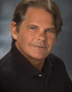 A headshot of David Hoines.